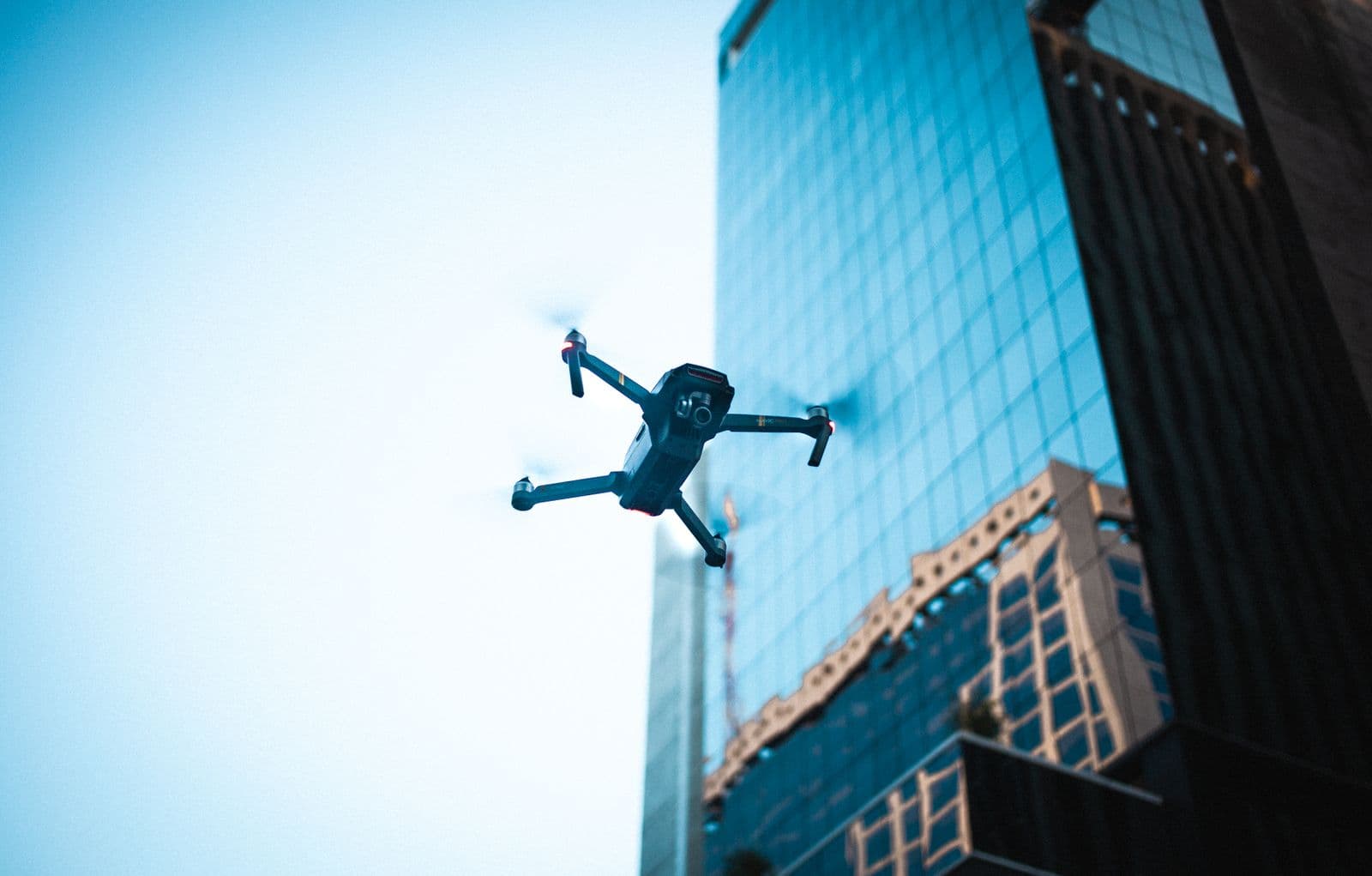 Drone over a modern city skyline at dusk
